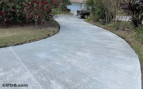 A Truck Is Parked On The Side Of A Curved Driveway GIF