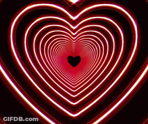 A Tunnel In The Shape Of A Heart With A Black Heart In The Middle GIF