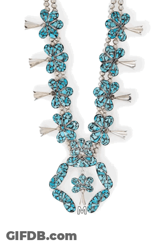 A Turquoise And Silver Circle With The Letter M Underneath It GIF