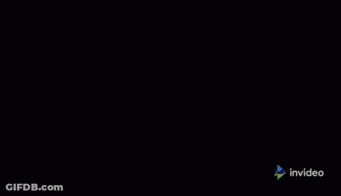 A Tv With A Clock On It And A Sign That Says Invideo On It GIF