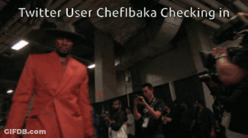 A Twitter User Named Chefibaka Checking In With A Picture Of A Man In An Orange Suit GIF