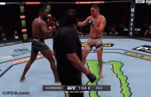 A Ufc Fight Between Edwards And Diaz Is Shown On A Screen GIF