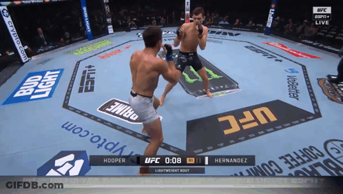 A Ufc Fight Between Hooper And Hernandez Is On Espn GIF