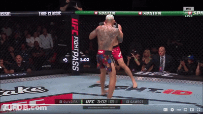 A UFC Fight Pass Advertisement Is Displayed On A Screen GIF
