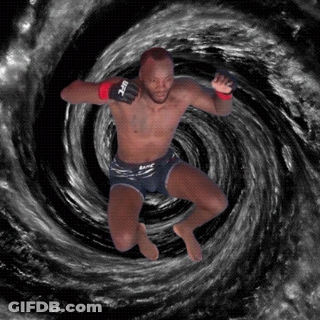A Ufc Fighter Is Jumping Through A Swirl GIF