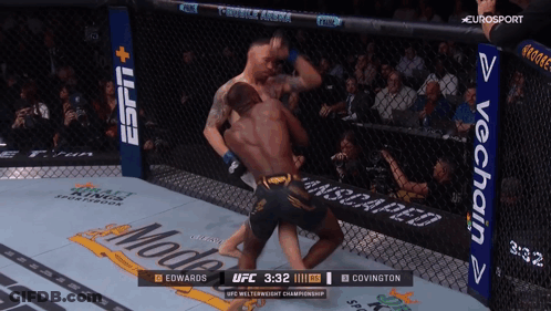 A Ufc Match Between Edwards And Covington Is Shown On Eurosport GIF