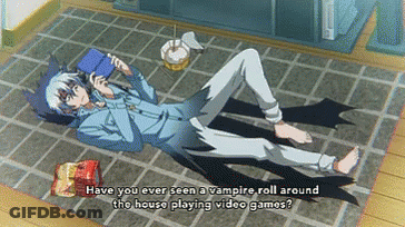 A Vampire Laying On The Floor With The Words Have You Ever Seen A Vampire Roll Around The House Playing Video Games Writ GIF