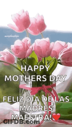 A Vase Filled With Pink Flowers And The Words `` Happy Mothers Day Feliz Dia De Las Madres Maestra '' GIF