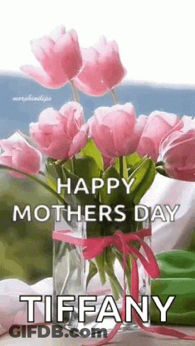 A Vase Filled With Pink Flowers With The Words `` Happy Mother 'S Day Tiffany '' Written On It . GIF