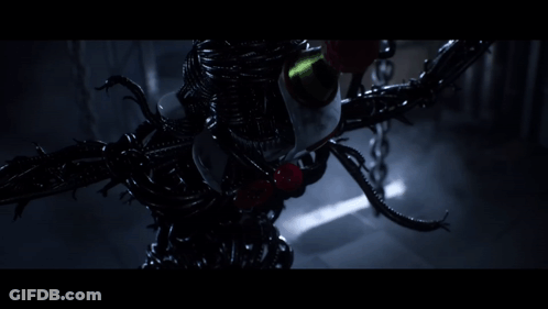 A Very Dark Room With A Very Strange Looking Object GIF