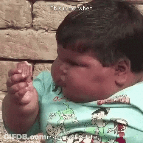 A Very Fat Child Is Eating A Piece Of Food With The Caption This Is Me When GIF