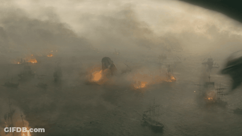 A Very Foggy Scene With Ships On Fire In The Water GIF