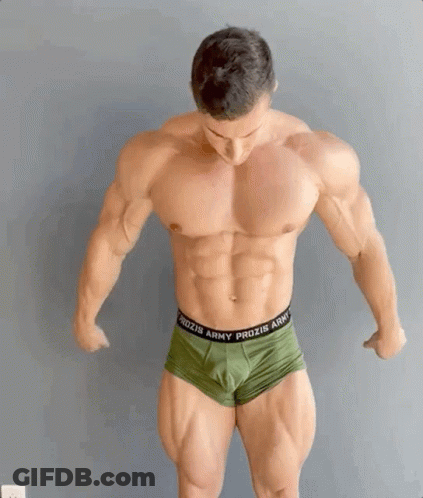 A Very Muscular Man Wearing Green Prozis Army Underwear GIF