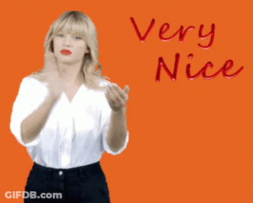 A Very Nice I Like It Sign With A Woman Clapping GIF