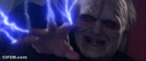 A Very Old Man Is Holding A Blue Light In His Hand . GIF