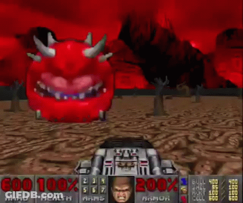 A Video Game Called Doom Has A Red Monster With Horns And A Face On It GIF