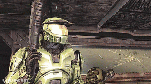 A Video Game Character Holding A Gun With The Number 1 On His Chest GIF