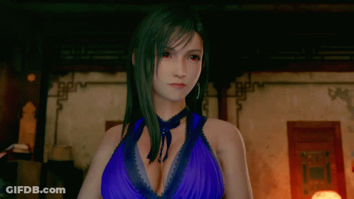 A Video Game Character In A Blue Dress Is Making A Gesture GIF