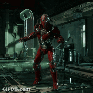 A Video Game Character In Red Armor Is Standing In A Room GIF