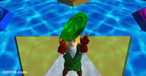 A Video Game Character Is Holding A Green Object In His Hand GIF