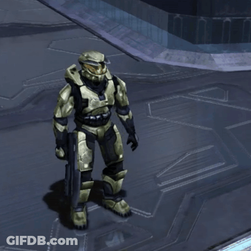 A Video Game Character Is Holding A Gun And Wearing A Yellow Helmet GIF
