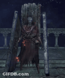 A Video Game Character Is Holding A Large Sword In A Dark Room . GIF