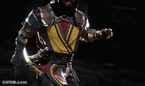 A Video Game Character Is Holding A Sword And A Chain That Is On Fire GIF