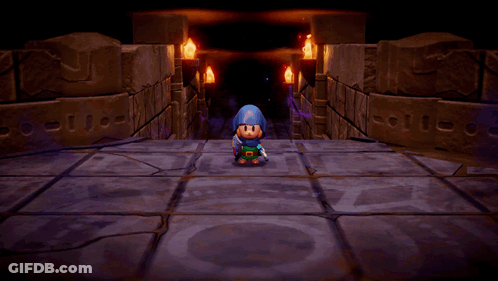 A Video Game Character Is Holding A Sword In A Dark Tunnel GIF