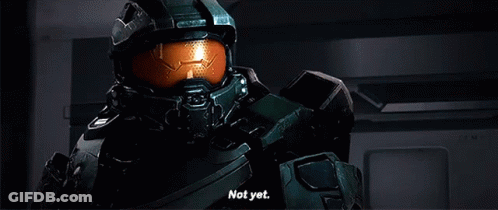 A Video Game Character Is Saying " Not Yet " In A Dark Room GIF