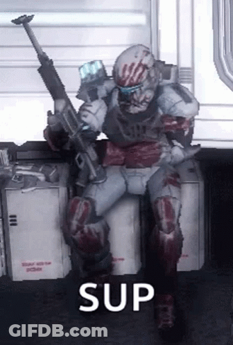 A Video Game Character Is Sitting On A Box Holding A Gun And The Word Sup Is Above Him . GIF