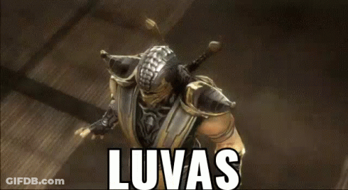 A Video Game Character Is Wearing A Mask And Holding A Sword And The Word Luvas Is Written Above Him . GIF