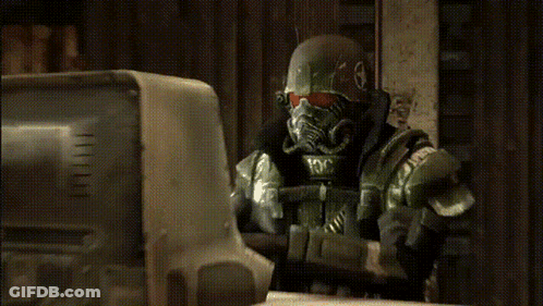 A Video Game Character Wearing A Helmet With A Red Visor GIF