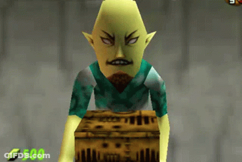 A Video Game Character With A Beard Is Standing Next To A Box With The Number 500 On It GIF