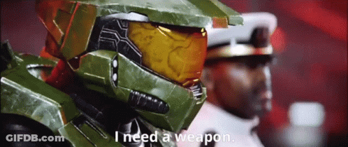 A Video Game Character With The Words I Need A Weapon GIF