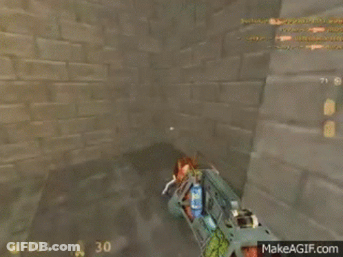 A Video Game Is Being Played On A Computer And A Person Is Holding A Gun . GIF