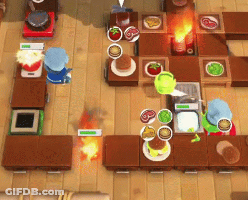 A Video Game Is Being Played On A Wooden Floor With A Hamburger On A Plate GIF