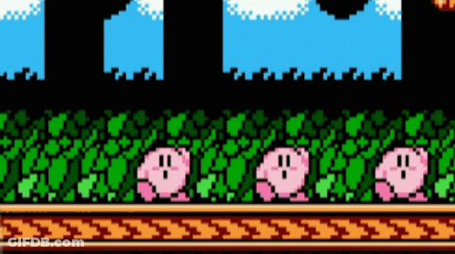 A Video Game Scene With Kirby Standing In The Grass . GIF