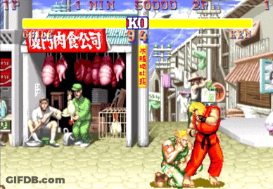 A Video Game Screen Shows A Man Fighting Another Man In Front Of A Store That Sells Meat GIF