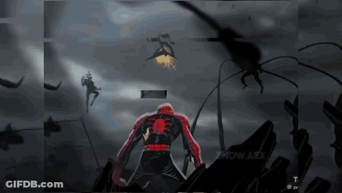A Video Game Screen Shows A Spider Man Fighting A Monster GIF
