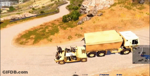 A Video Game Screen Shows A Truck Pulling A Jeep GIF