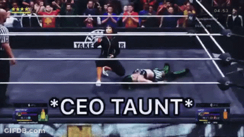 A Video Game Screen Shows A Wrestler Laying On The Ground With The Words Ceo Taunt Above Him GIF