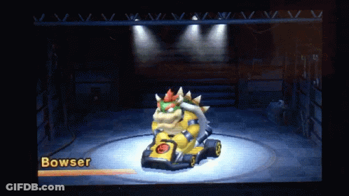 A Video Game Screen Shows Bowser In A Yellow Kart GIF