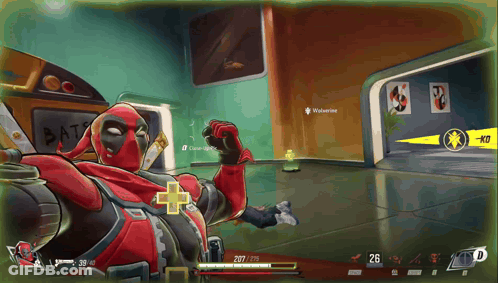 A Video Game Screen Shows Deadpool Laying On The Floor GIF