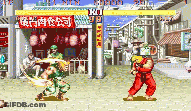 A Video Game Screen Shows Two Fighters Fighting In Front Of A Store That Says Ko 99 GIF