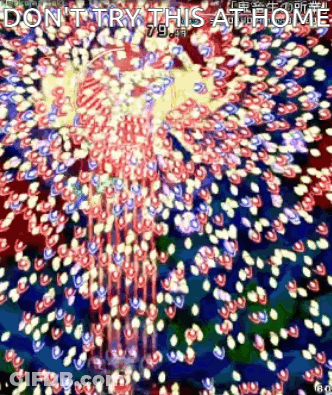 A Video Game Screen With A Bunch Of Fireworks And The Words `` Do N't Try This At Home '' GIF