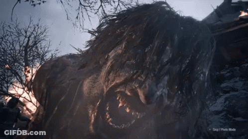 A Video Game Screenshot Of A Giant Monster With A Huge Head . GIF
