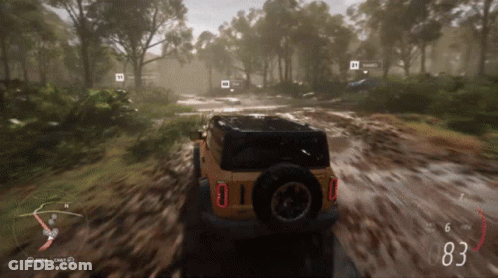A Video Game Shows A Jeep Driving Through A Muddy Area With The Number 83 On The Screen GIF