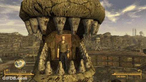 A Video Game Shows A Man Standing In Front Of A Large Mouth With The Letters Cmd On It GIF