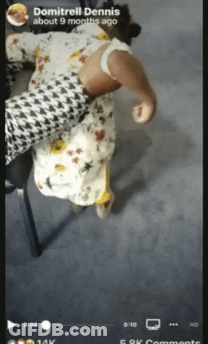 A Video Of A Baby Being Spanked By A Man Named Domitrelli Dennis GIF