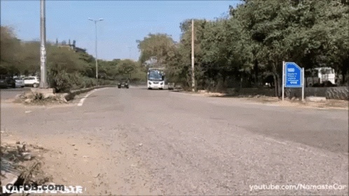 A Video Of A Bus Driving Down A Road With A Youtube Link GIF